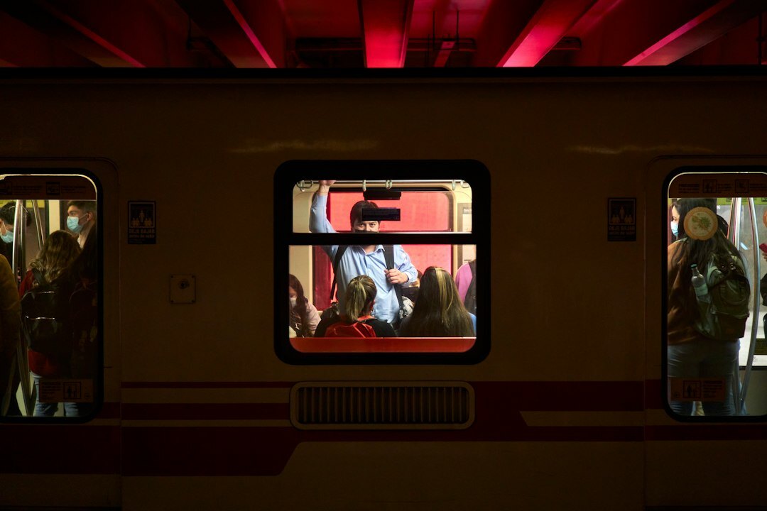 Public transportation scene inside a crowded Santiago metro car