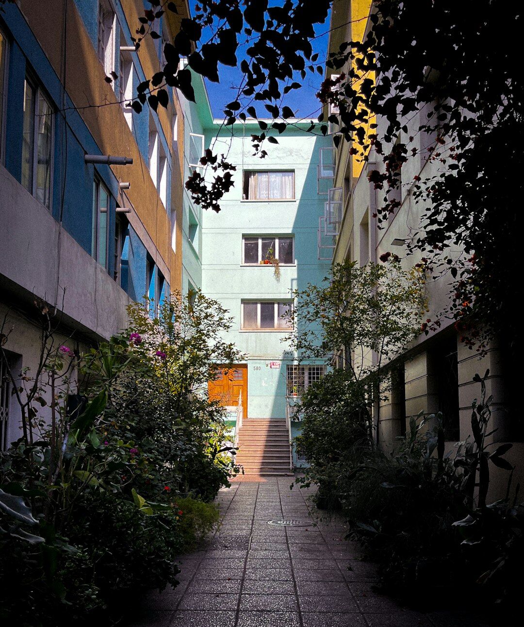 Narrow street in central Santiago with colorful facades